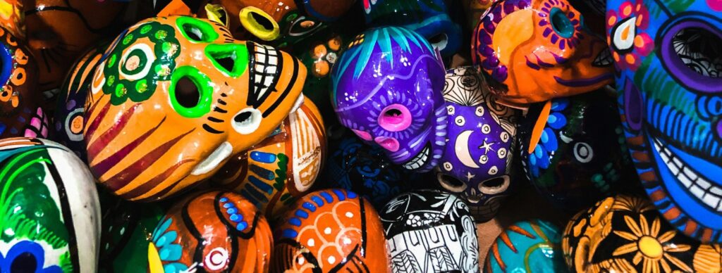 An abundance of colorful painted skulls.