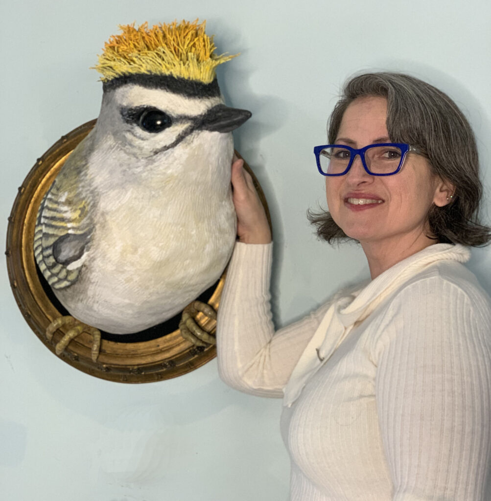 Julia Kemerer with her sculpture, Make Way for the King