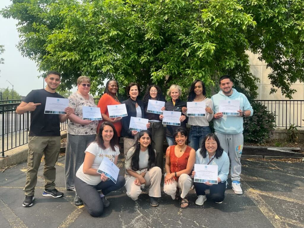 The Accelerator team celebrating with the certified promotoras group.